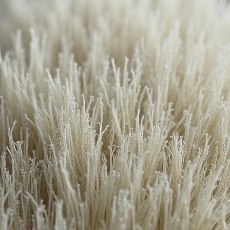 Primo piano della texture di una carta da parati in fibra ecologica, che esprime un'attenzione alla sostenibilità.